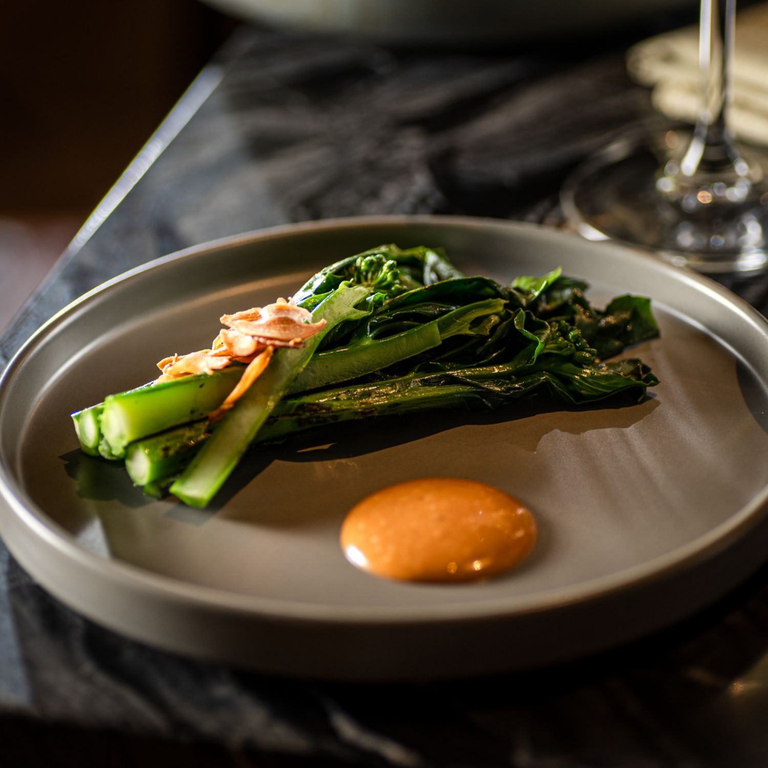 Chargrilled kailan with special sauce and wilg garlic oil from Burnt & Co