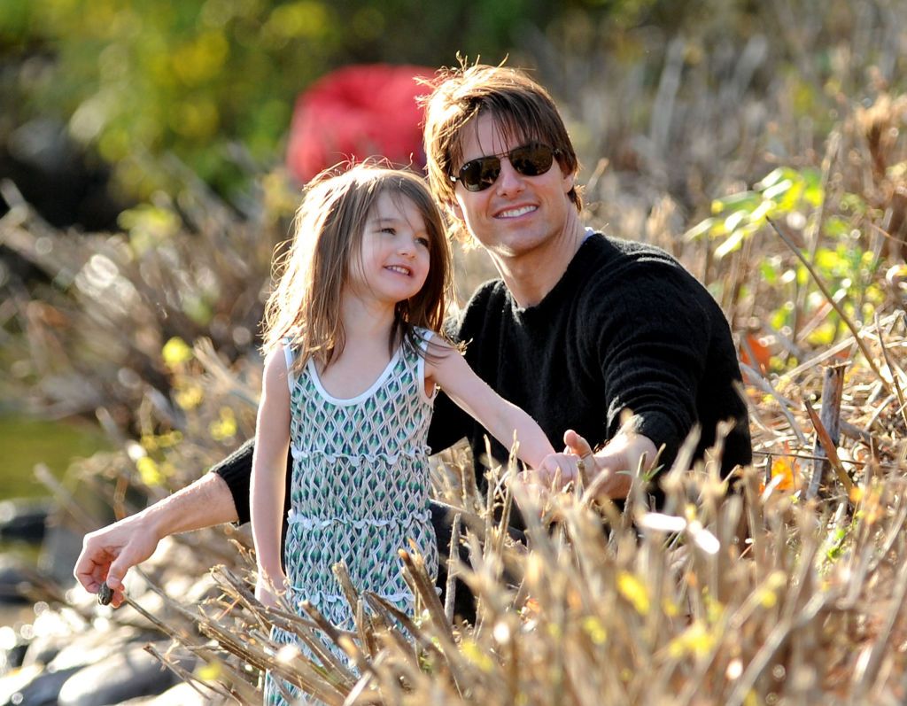 CAMBRIDGE, MA - OCTOBER 10: Suri Cruise and Tom Cruise visit Charles River Basin on October 10, 2009 in Cambridge, Massachusetts. (Photo by James Devaney/WireImage)