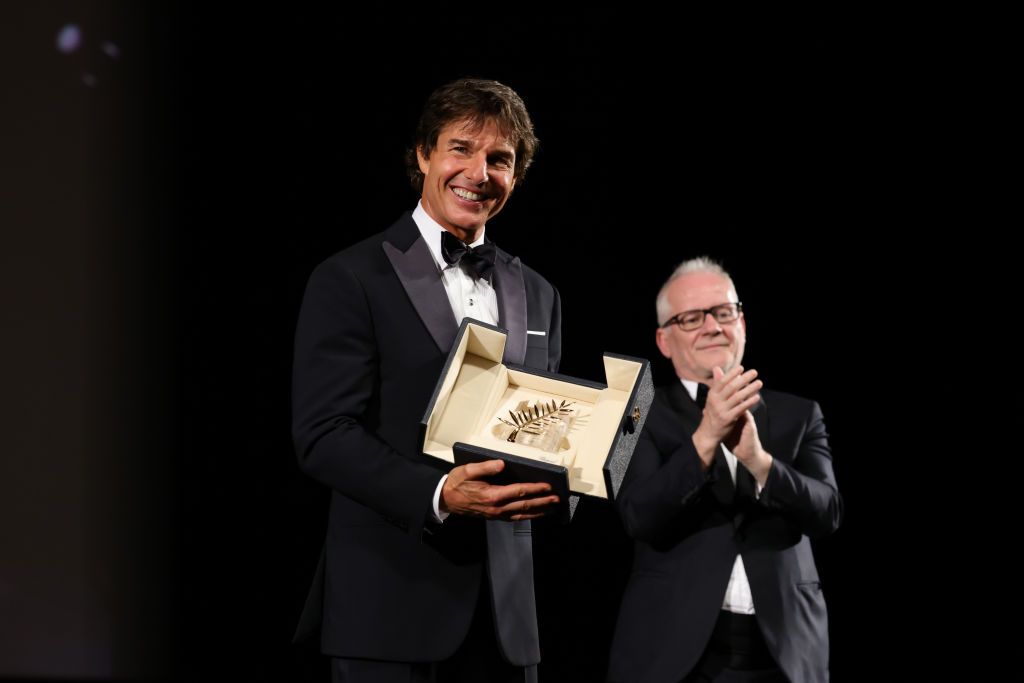 CANNES, FRANCE - MAY 18: Tom Cruise and Cannes Film Festival director Thierry Fremaux attend a ceremony as Tom Cruise receives a Palme d'Or during the 75th annual Cannes film festival at Palais des Festivals on May 18, 2022 in Cannes, France. (Photo by Andreas Rentz/Getty Images)