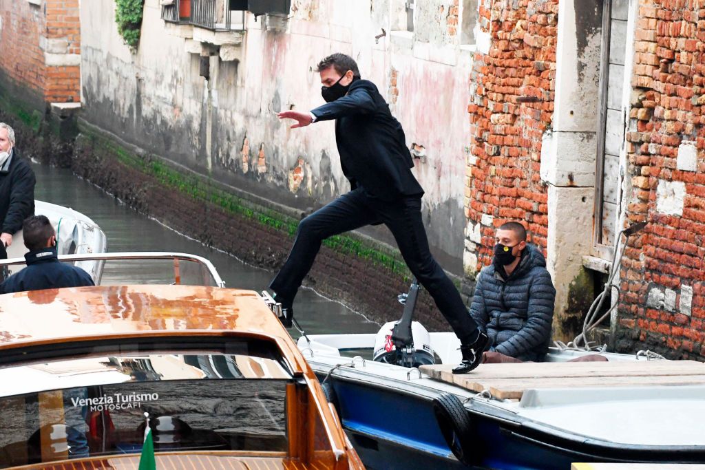 VENICE, ITALY - OCTOBER 20:  Tom Cruise jumps into a water taxi on the set of "Mission: Impossible 7" October 20, 2020 in Venice, Italy. (Photo by MEGA/GC Images)