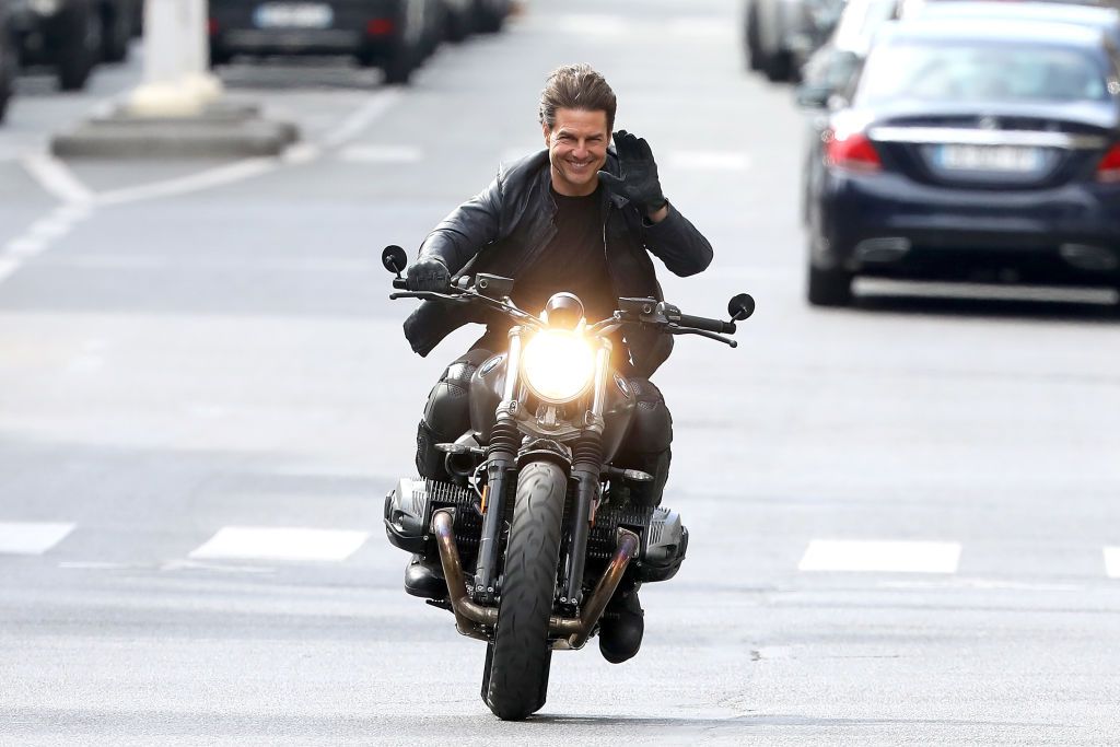 PARIS, FRANCE - APRIL 30:  Actor Tom Cruise  is seen riding a BMW bike on the set of 'Mission Impossible 6 Gemini' on Avenue de l'Opera on April 30, 2017 in Paris, France.  (Photo by Pierre Suu/GC Images)
