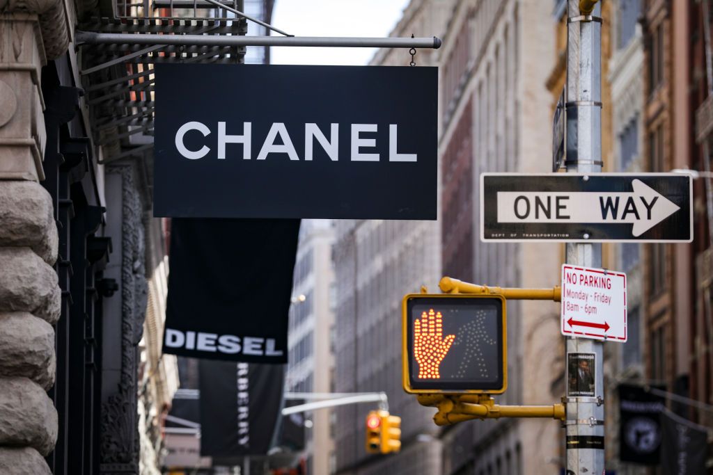 NEW YORK, NY - FEBRUARY 19: Signage for a Chanel store hangs in the SoHo neighborhood of Manhattan, February 19, 2019 in New York City. Karl Lagerfeld, a prolific and influential German fashion designer, passed away on Tuesday in Paris at the age of 85.(Photo by Drew Angerer/Getty Images)