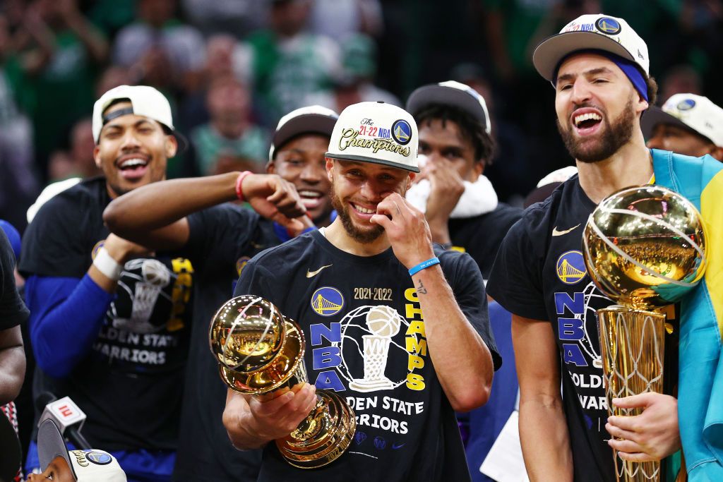 BOSTON, MASSACHUSETTS - JUNE 16: Stephen Curry #30 and Klay Thompson #11 of the Golden State Warriors celebrate after defeating the Boston Celtics 103-90 in Game Six of the 2022 NBA Finals at TD Garden on June 16, 2022 in Boston, Massachusetts. NOTE TO USER: User expressly acknowledges and agrees that, by downloading and/or using this photograph, User is consenting to the terms and conditions of the Getty Images License Agreement. (Photo by Elsa/Getty Images)