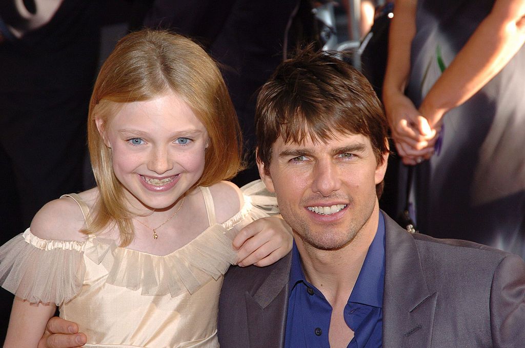 Dakota Fanning and Tom Cruise during War of the Worlds New York City Premiere - Arrivals at Ziegfield Theater in New York City, New York, United States. (Photo by Lawrence Lucier/FilmMagic)