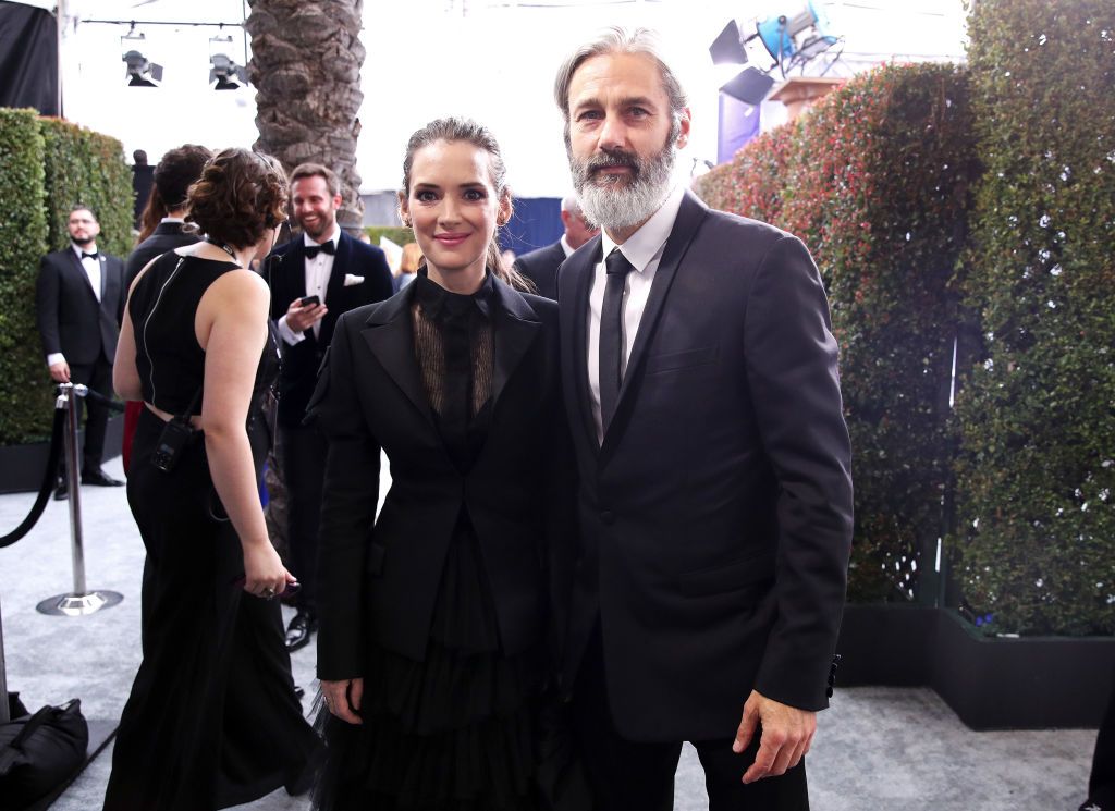LOS ANGELES, CALIFORNIA - JANUARY 19: (L-R) Winona Ryder and Scott Mackinlay Hahn attend the 26th Annual Screen ActorsÂ Guild Awards at The Shrine Auditorium on January 19, 2020 in Los Angeles, California. (Photo by Rich Fury/Getty Images)