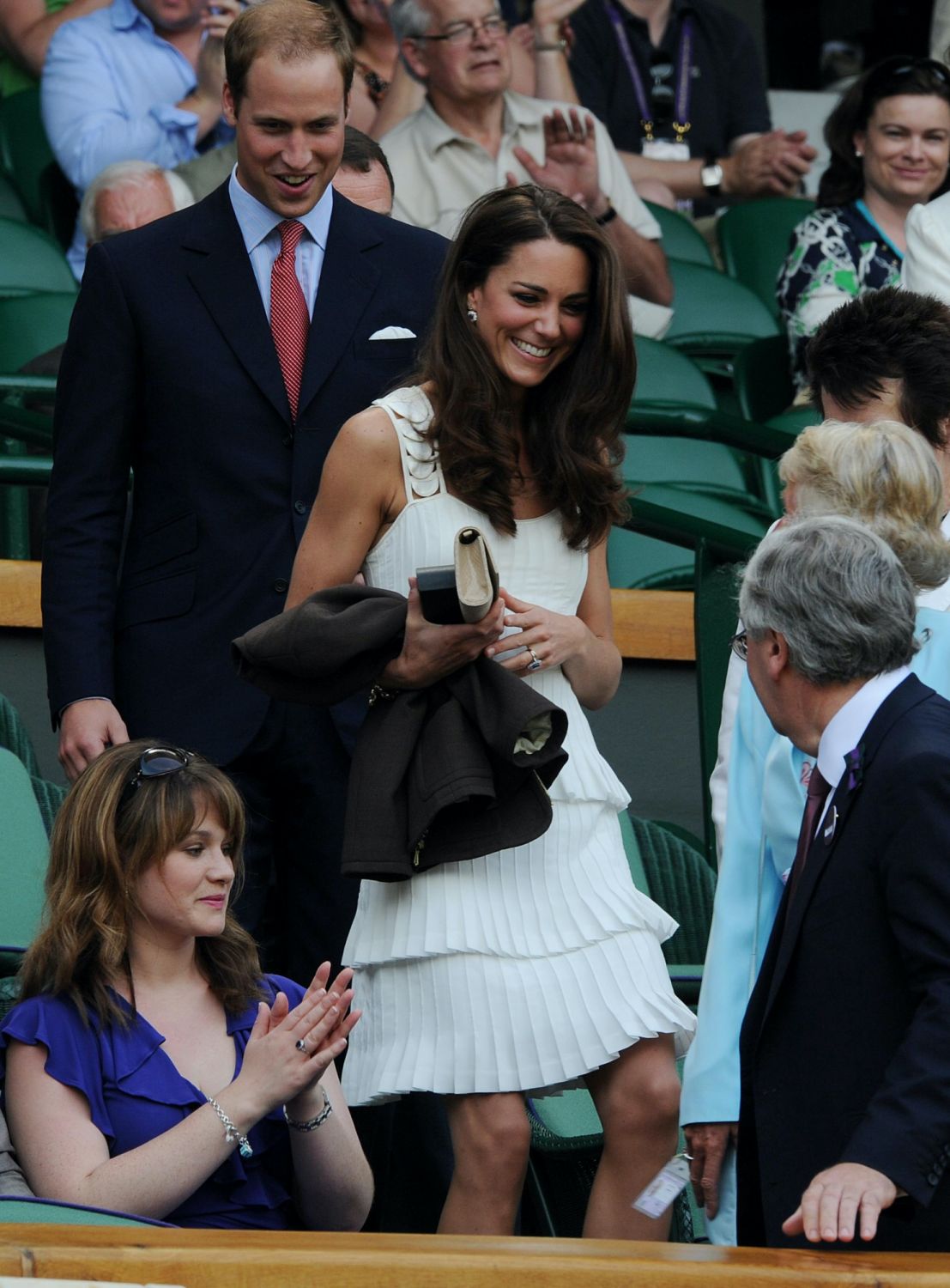 The Duke and Duchess of Cambridge arrive in the Royal Box on Centre Court during day seven of the 2011 Wimbledon Championships at the All England Lawn Tennis and Croquet Club, Wimbledon. (Photo by Anthony Devlin/PA Images via Getty Images)