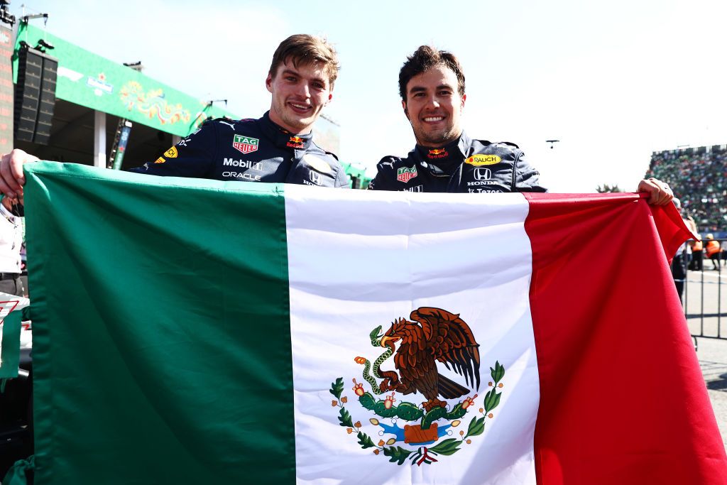 MEXICO CITY, MEXICO - NOVEMBER 07: Race winner Max Verstappen of Netherlands and Red Bull Racing and third placed Sergio Perez of Mexico and Red Bull Racing celebrate in parc ferme during the F1 Grand Prix of Mexico at Autodromo Hermanos Rodriguez on November 07, 2021 in Mexico City, Mexico. (Photo by Mark Thompson/Getty Images)