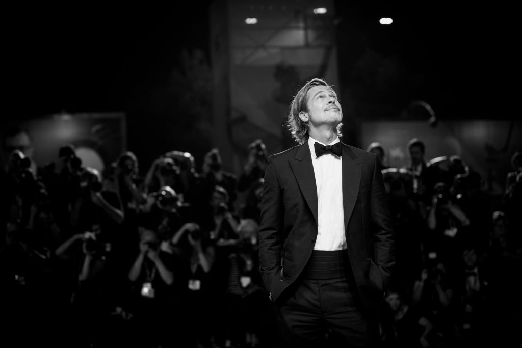 VENICE, ITALY - AUGUST 29: (EDITORS NOTE: Image has been converted to black and white.) Brad Pitt walks the red carpet ahead of the "Ad Astra" screening during the 76th Venice Film Festival at Sala Grande on August 29, 2019 in Venice, Italy. (Photo by Tristan Fewings/Getty Images)