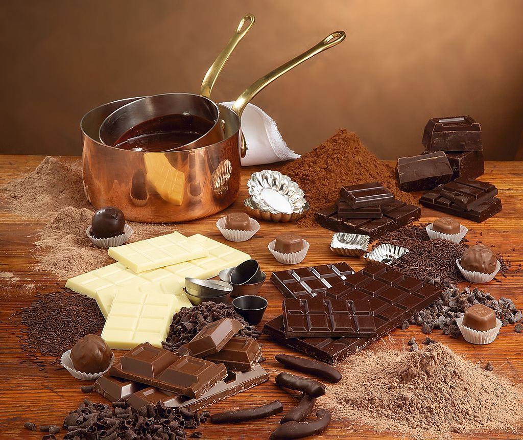 UNSPECIFIED - JUNE 06:  Assorted chocolates with cocoa powder and saucepans  (Photo by DEA / PRIMA PRESS/De Agostini via Getty Images)