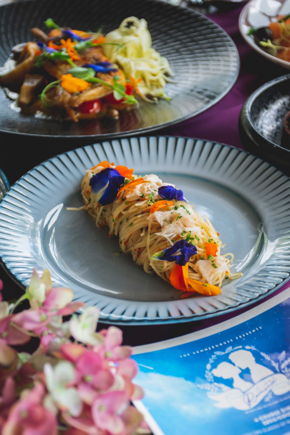 The Summerhouse' cold angel hair pasta garnished with blue pea flower from its own garden