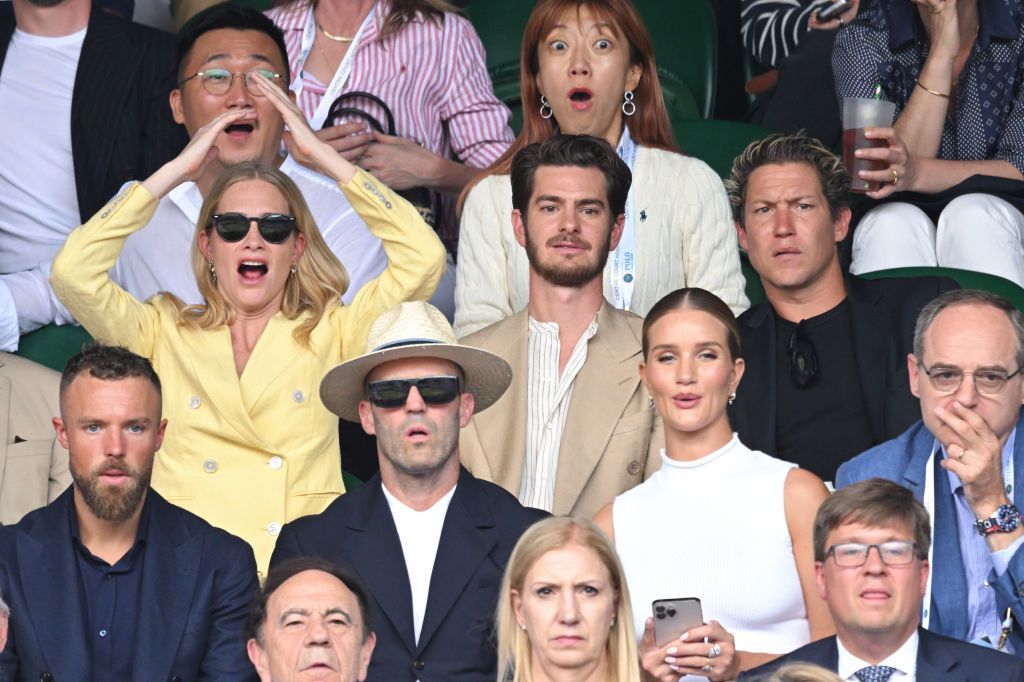 LONDON, ENGLAND - JULY 10: Poppy Delevingne, Andrew Garfield, Vito Schnabel, Richard Moore, Jason Statham and Rosie Huntington-Whiteley attend day 14 of the Wimbledon Tennis Championships at All England Lawn Tennis and Croquet Club on July 10, 2022 in London, England. (Photo by Karwai Tang/WireImage)
