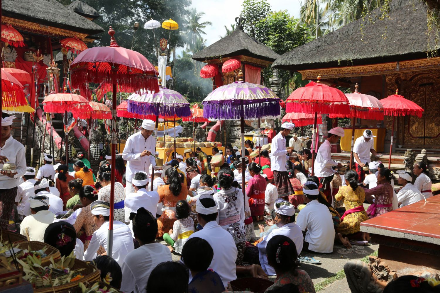 Devotees before prayers during the annual temple festival of Taman Pule in Bali