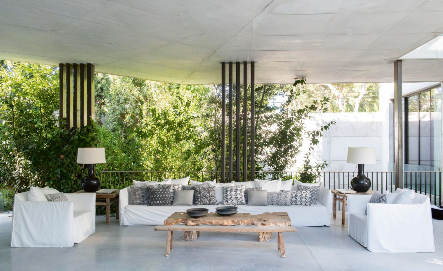 The property is surrounded by verdant foliage