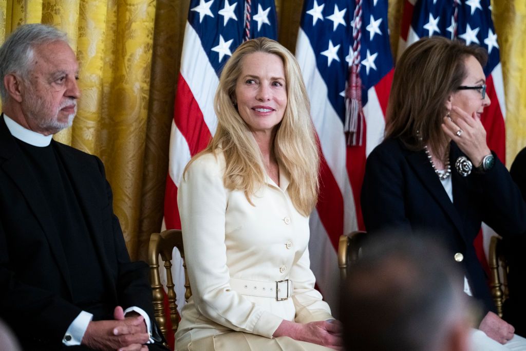 UNITED STATES - JULY 7: From left, Father Alexander Karloutsos, Laurene Powell Jobs, wife of the late Steve Jobs, and former Rep. Gabrielle Giffords, D-Ariz., attend a Presidential Medal of Freedom, the nation's highest civilian honor, ceremony at the White House on Thursday, July 7, 2022. (Tom Williams/CQ-Roll Call, Inc via Getty Images)