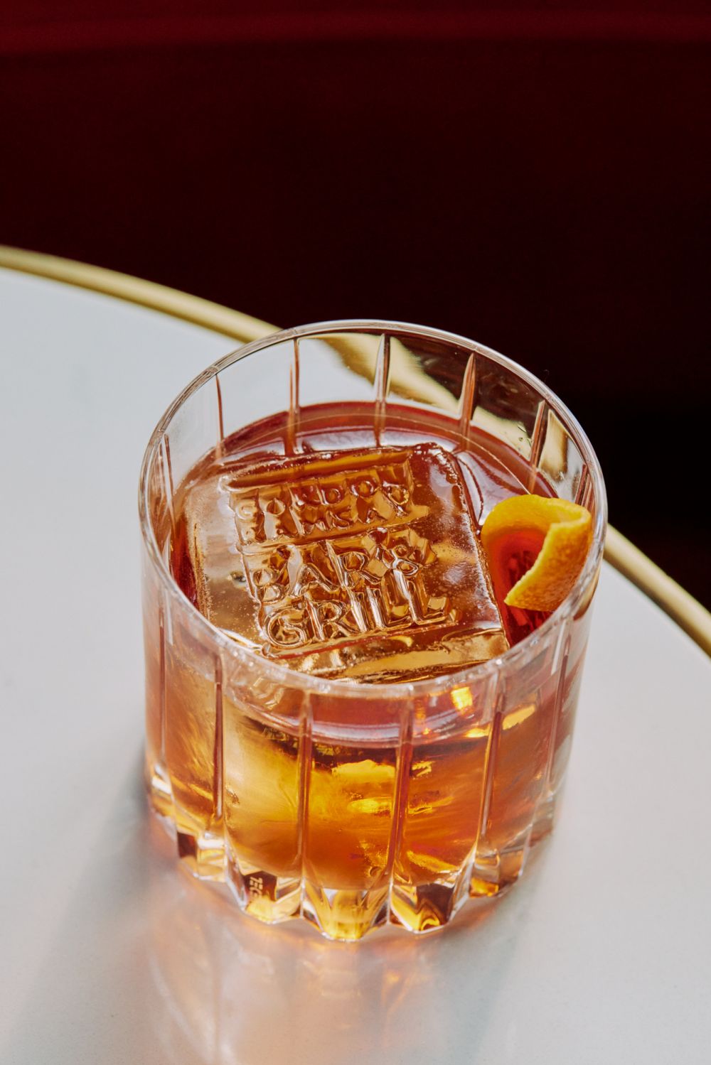 The barrel-aged Negroni comes with a custom two-by-two-inch ice cube to ensure it doesn't melt and dilute the drink.