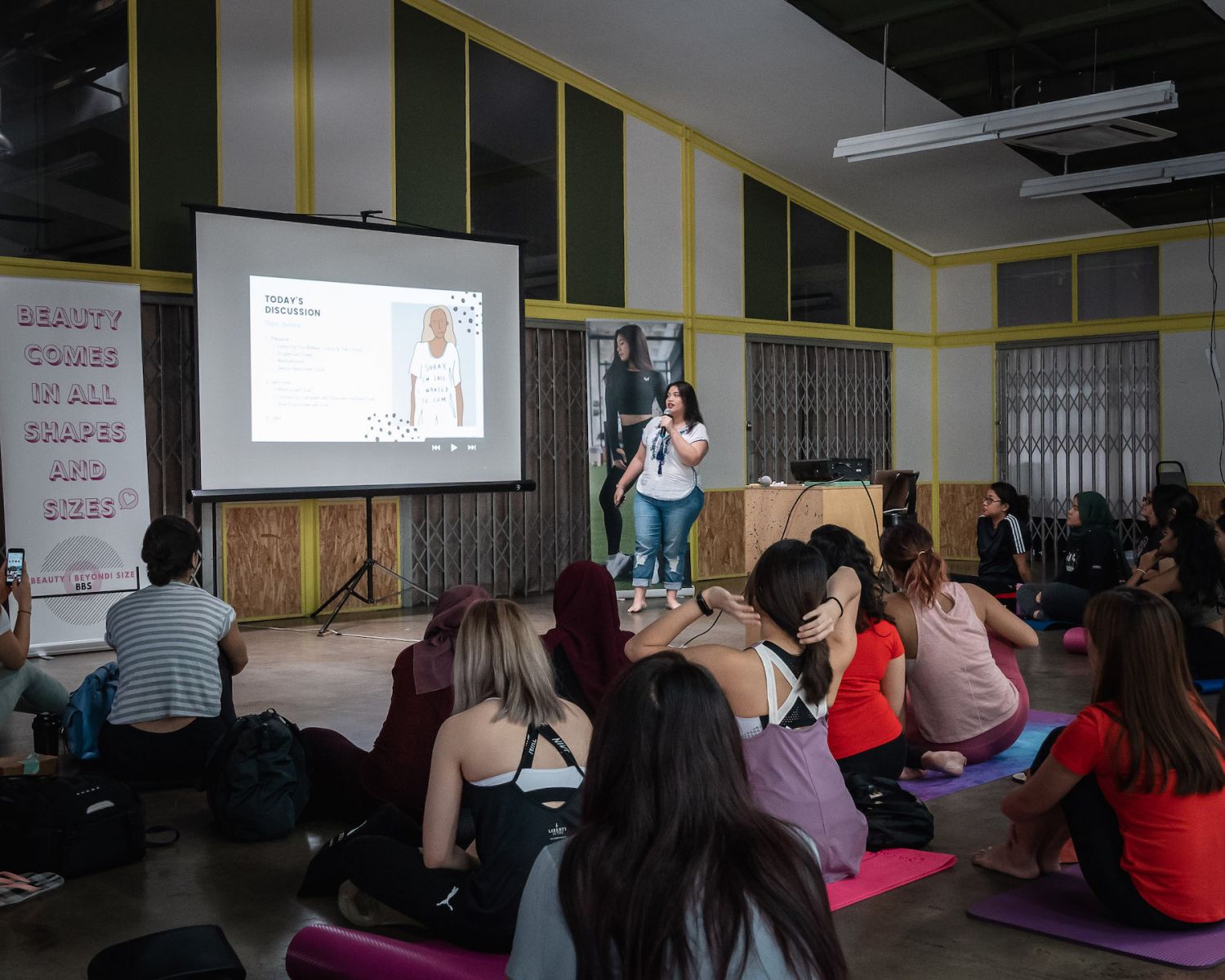 Jasmine speaking at the 'Beauty Beyond Size' event