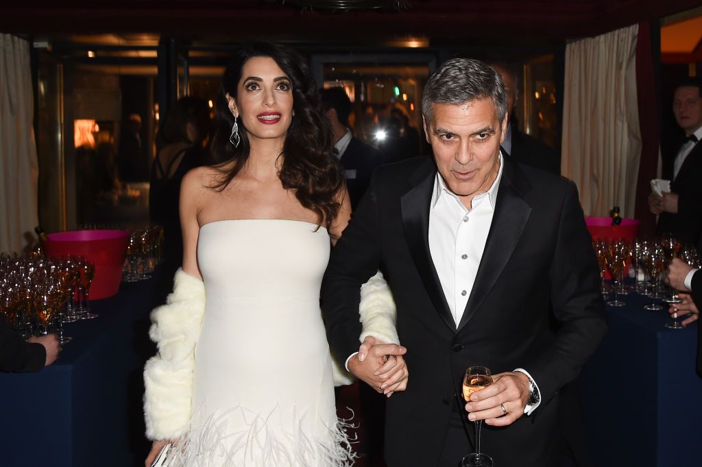 PARIS, FRANCE - FEBRUARY 24:  George Clooney and Amal Clooney attend the Cesar Dinner at Le Fouquet's on February 24, 2017 in Paris, France.  (Photo by Stephane Cardinale - Corbis/Getty Images)