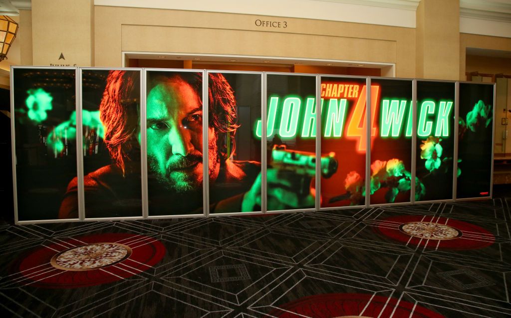 LAS VEGAS, NEVADA - APRIL 25: An illuminated advertisement for the upcoming movie "John Wick: Chapter 4" is displayed at Caesars Palace during CinemaCon 2022, the official convention of the National Association of Theatre Owners, on April 25, 2022 in Las Vegas, Nevada. (Photo by Gabe Ginsberg/WireImage)