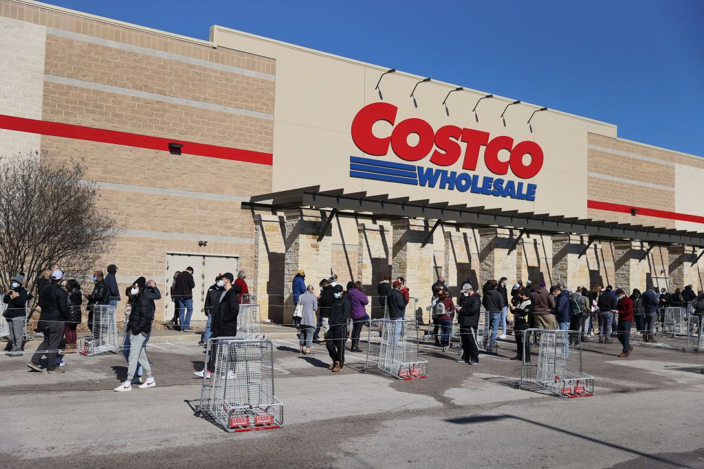 AUSTIN, TEXAS - FEBRUARY 20: People wait to shop at the Costco as they look to purchase essentials on February 20, 2021 in Austin, Texas. Winter storm Uri disrupted the supply chain to stores causing many stores to run out of food supplies for customers. (Photo by Joe Raedle/Getty Images)