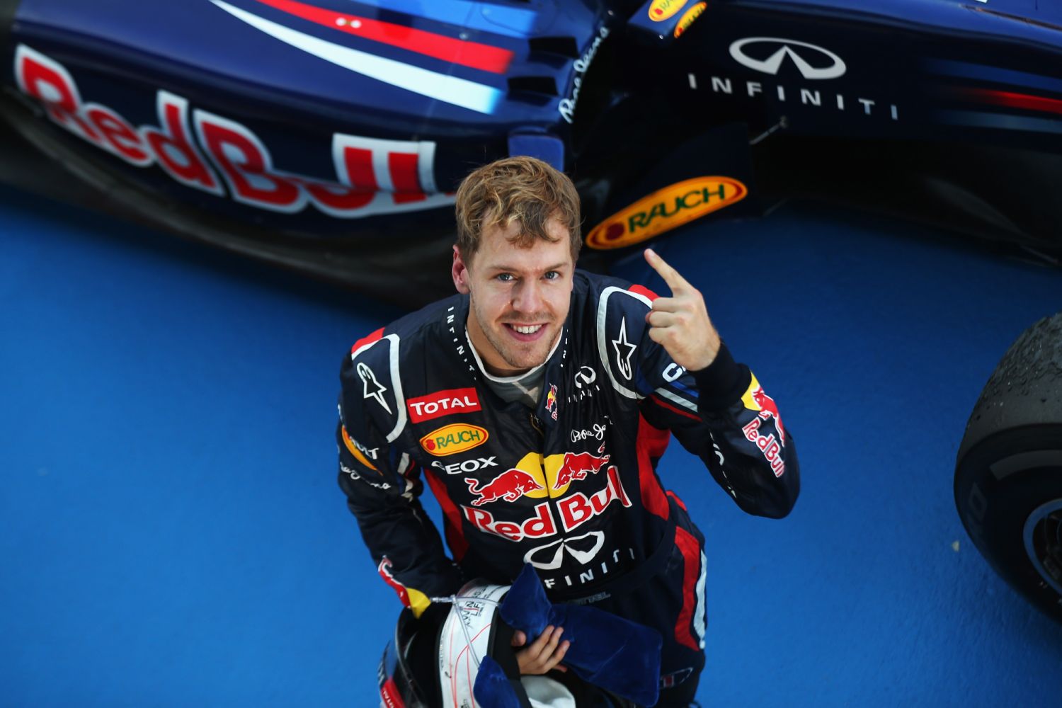 SUZUKA, JAPAN - OCTOBER 07: Sebastian Vettel of Germany and Red Bull Racing celebrates in parc ferme after winning the Japanese Formula One Grand Prix at the Suzuka Circuit on October 7, 2012 in Suzuka, Japan. (Photo by Mark Thompson/Getty Images)