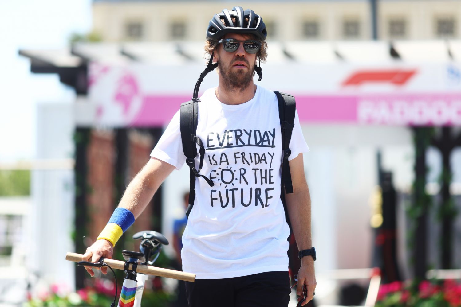 BAKU, AZERBAIJAN - JUNE 10: Sebastian Vettel of Germany and Aston Martin F1 Team walks in the Paddock prior to practice ahead of the F1 Grand Prix of Azerbaijan at Baku City Circuit on June 10, 2022 in Baku, Azerbaijan. (Photo by Clive Rose/Getty Images)