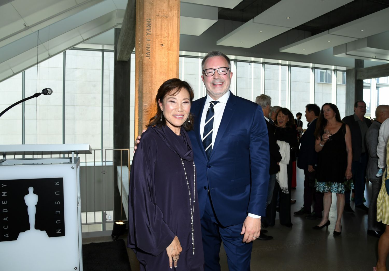 LOS ANGELES, CALIFORNIA - JUNE 21: (L-R) Bill Kramer and Janet Yang attend the pillar unveiling ceremony for academy governor at large Janet Yang at The Academy Museum of Motion Pictures on June 21, 2022 in Los Angeles, California. (Photo by JC Olivera/Getty Images)