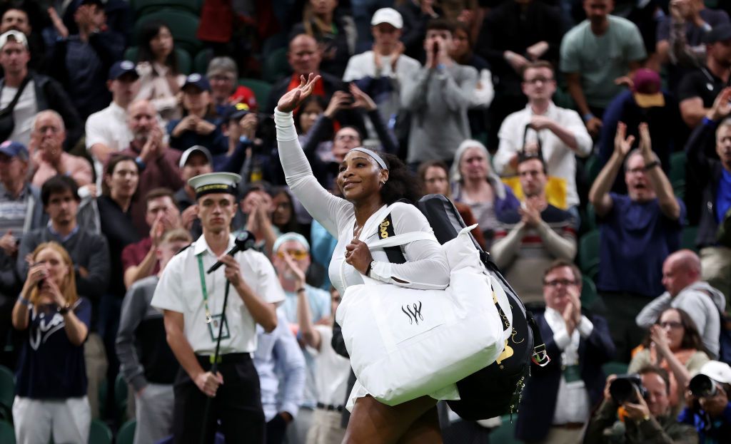 LONDON, ENGLAND - JUNE 28: Serena Williams of The United States waves to the crowd after losing against Harmony Tan of France during their Women's Singles First Round Match on day two of The Championships Wimbledon 2022 at All England Lawn Tennis and Croquet Club on June 28, 2022 in London, England. (Photo by Clive Brunskill/Getty Images)