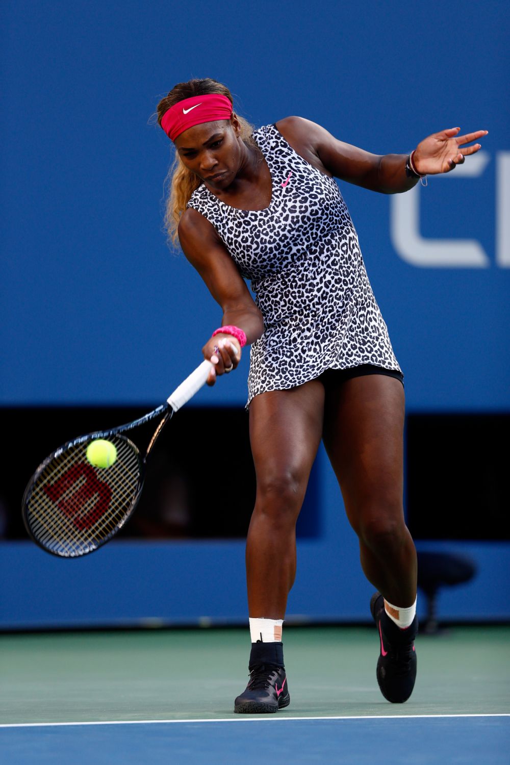 NEW YORK, NY - SEPTEMBER 07: Serena Williams of the United States returns a shot against Caroline Wozniacki of Denmark during their women's singles final match on Day fourteen of the 2014 US Open at the USTA Billie Jean King National Tennis Center on September 7, 2014 in the Flushing neighborhood of the Queens borough of New York City. (Photo by Julian Finney/Getty Images)