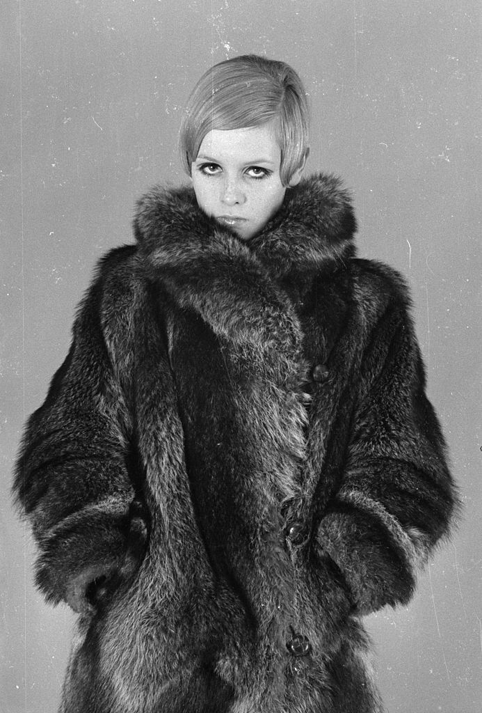 21st February 1966: English fashion model Twiggy wearing a fur coat. (Photo by Potter/Express/Getty Images)