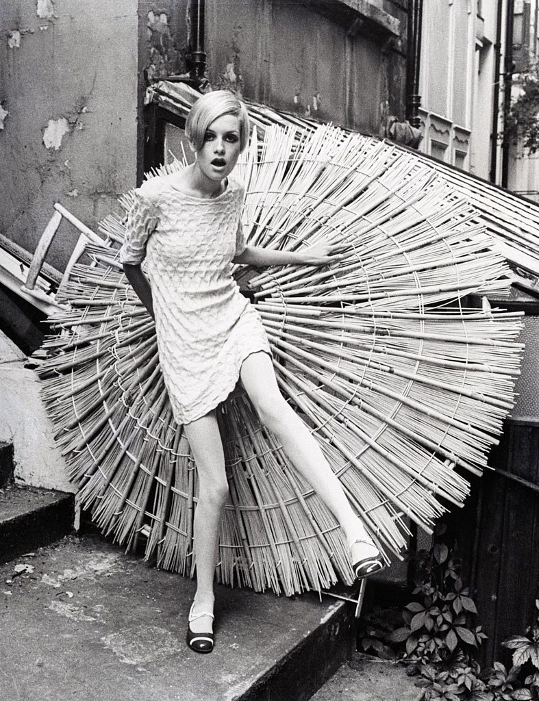 British fashion model Twiggy poses outdoors in 1966. Her professional nickname came from her thin, angular build, which was unusual in the modeling world in the 1960s.