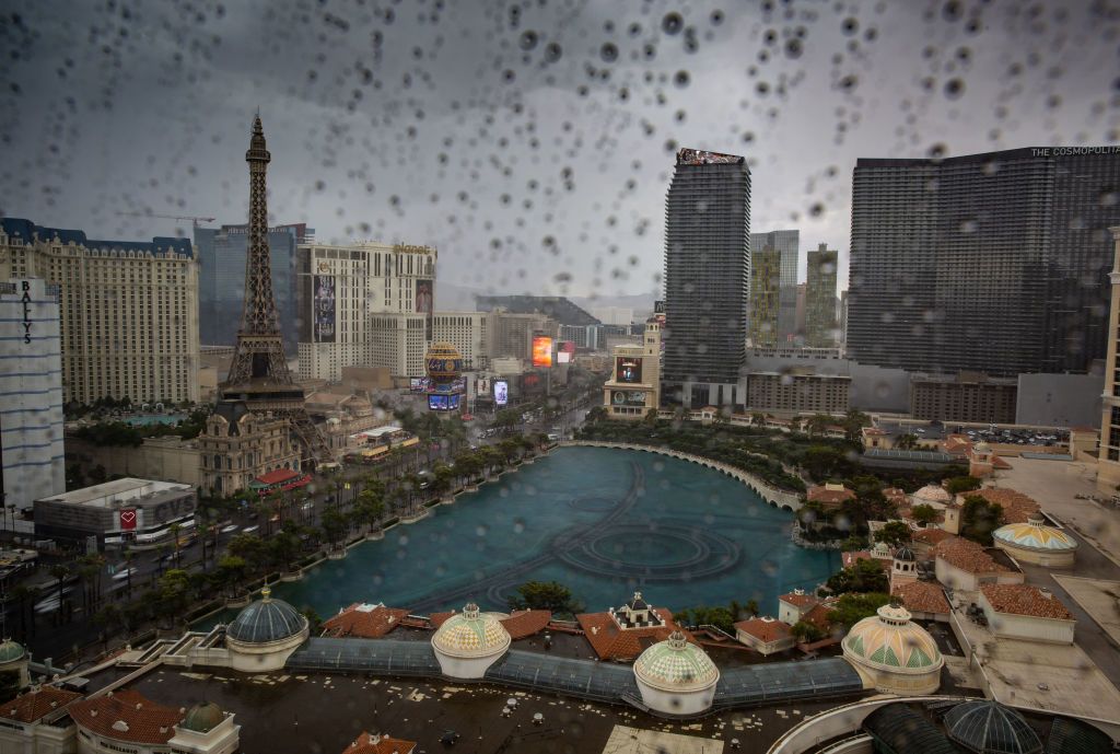 LAS VEGAS, NV - JULY 15: The Bellagio Hotel Water Fountain Lake on the Las Vegas Strip is viewed from a tower at Caesars Palace Hotel & Casino during an unusual thunderstorm on July 15, 2022 in Las Vegas, Nevada. Conventions and gamblers have once again returned in large numbers to Sin City this summer despite a surge of infections and hospitalizations due to the latest Omicron SARS-Covid BA.5 variant. (Photo by George Rose/Getty Images)