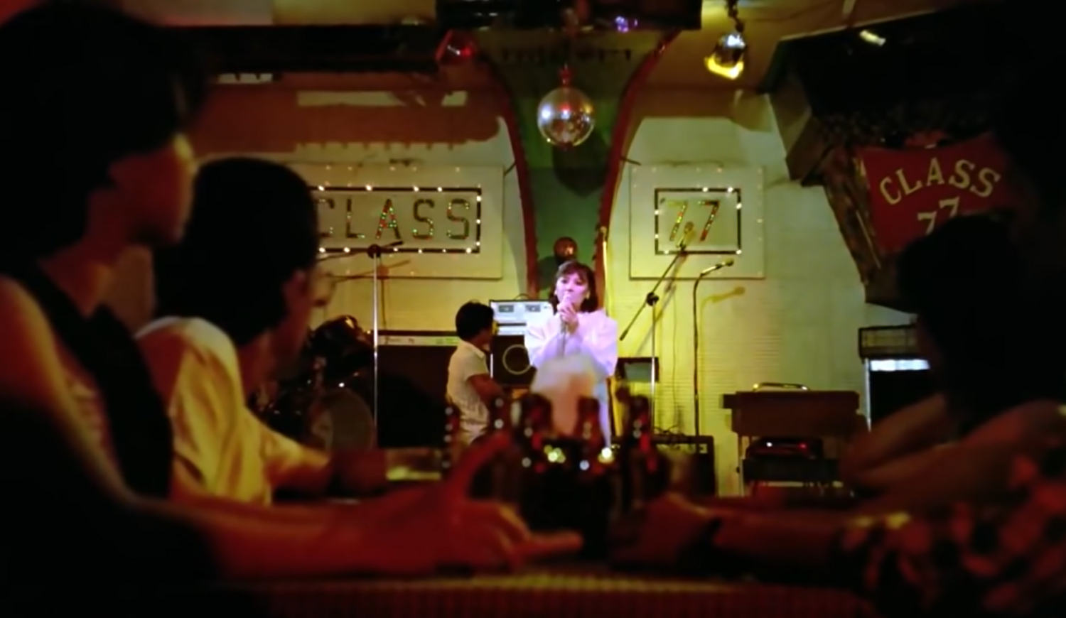Nico visits a local bar and discovers Dorina’s hidden prowess in singing