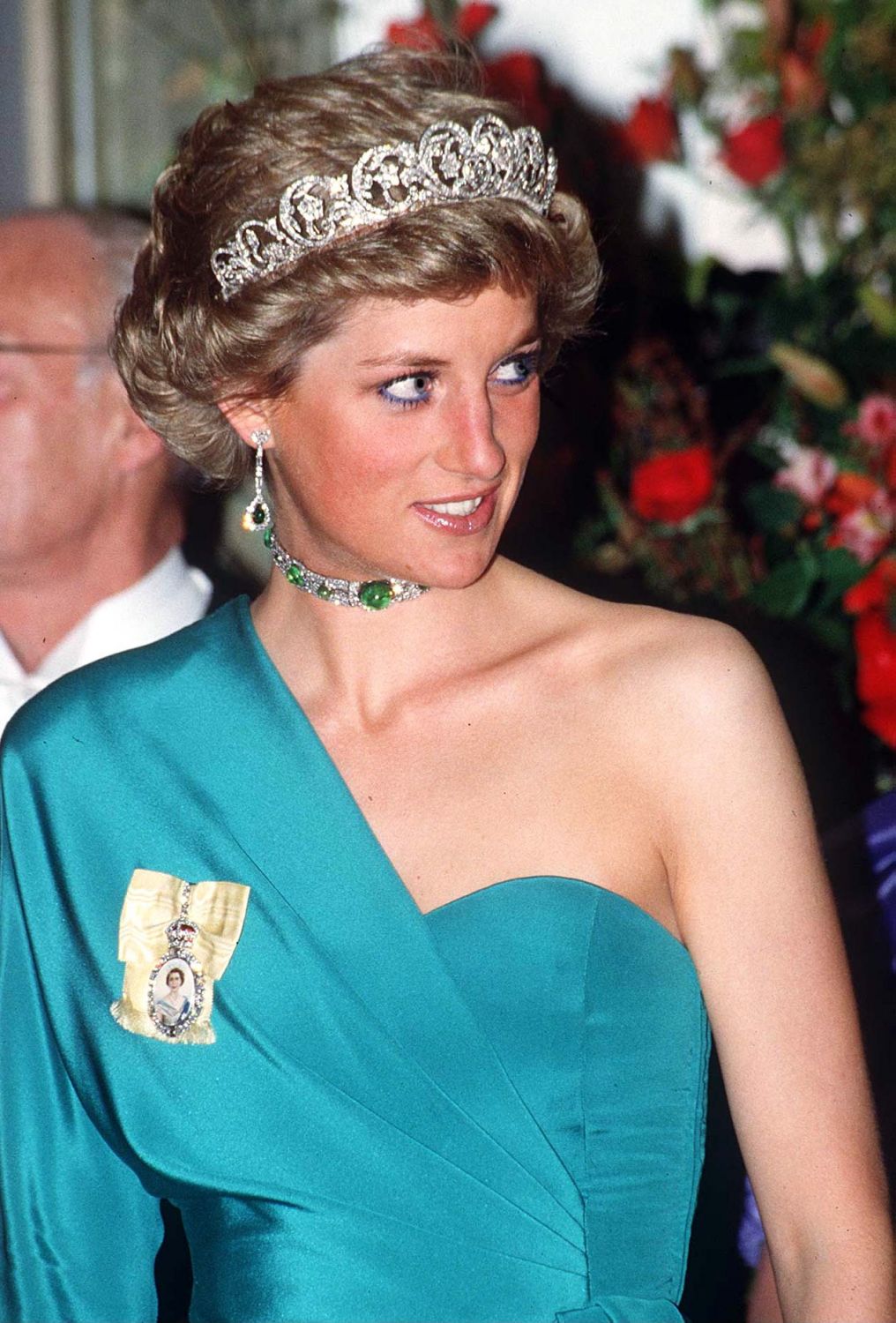 At a banquet at Claridges wearing The Spencer Diamond Tiara, Queen Mary's cabochon emerald and diamond choker necklace (Photo: Tim Graham Photo Library/Getty Images)