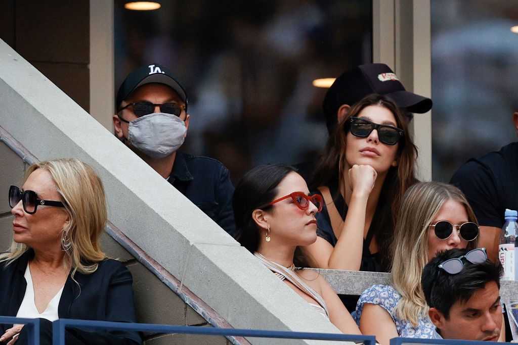 NEW YORK, NEW YORK - SEPTEMBER 12: Actor Leonardo DiCaprio and his girlfriend, model/actress, Camila Morrone watch the Men's Singles final match between Daniil Medvedev of Russia and Novak Djokovic of Serbia on Day Fourteen of the 2021 US Open at the USTA Billie Jean King National Tennis Center on September 12, 2021 in the Flushing neighborhood of the Queens borough of New York City.  (Photo by Sarah Stier/Getty Images)