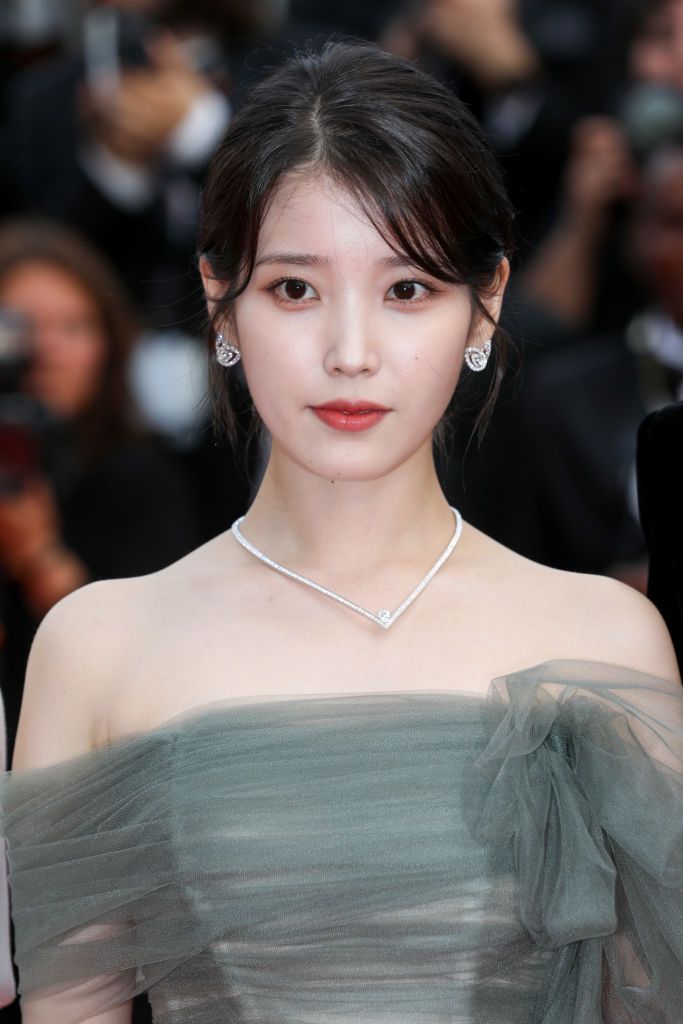 CANNES, FRANCE - MAY 26: Lee Ji-eun attend the screening of "Broker (Les Bonnes Etoiles)" during the 75th annual Cannes film festival at Palais des Festivals on May 26, 2022 in Cannes, France. (Photo by Stephane Cardinale - Corbis/Corbis via Getty Images)