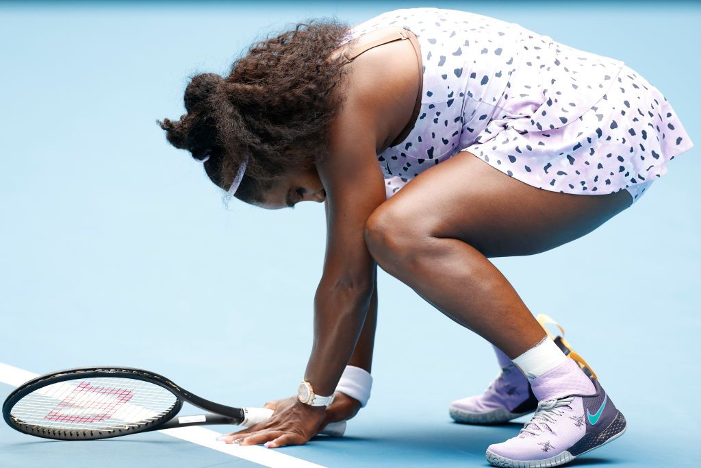 MELBOURNE, AUSTRALIA - JANUARY 24: Serena Williams of the United States reacts during her Women's Singles third round match against Qiang Wang of China on day five of the 2020 Australian Open at Melbourne Park on January 24, 2020 in Melbourne, Australia. (Photo by Fred Lee/Getty Images)