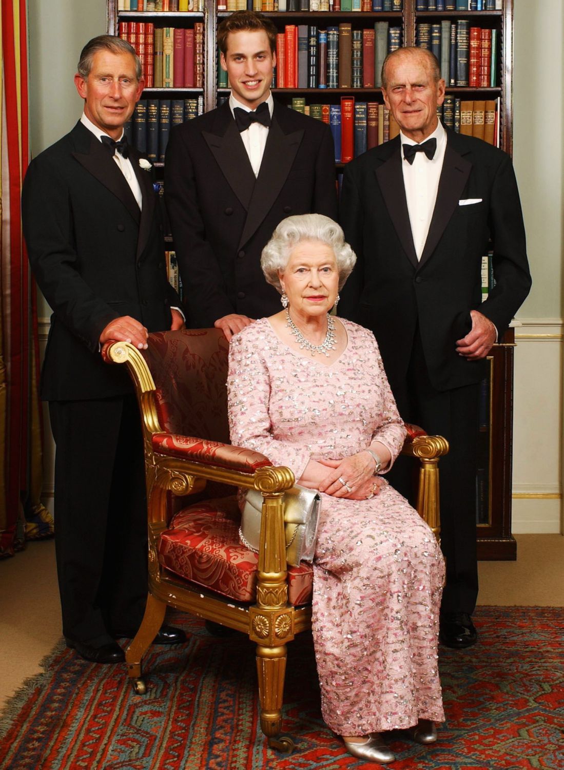 Three generations of the British Royal family - Queen Elizabeth II, Prince Philip, Duke of Edinburgh, Charles, Prince of Wales and Prince William pose for a photograph at Clarence House before a dinner to mark the 50th anniversary of the Queen's Coronation. (Photo: Getty Images)