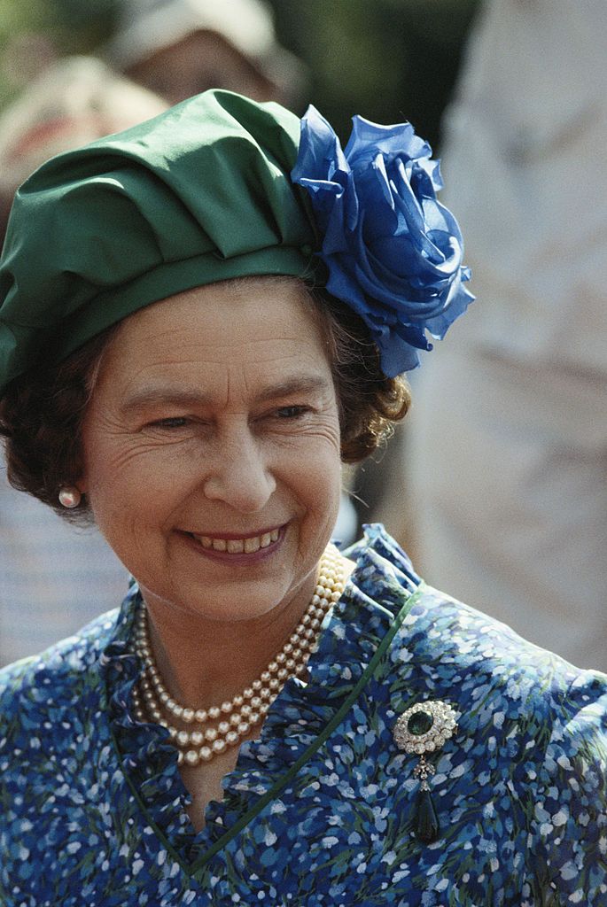 Queen Elizabeth II smiling during a visit to Hyderabad in India, 19 November 1983. The Queen was on a nine-day State Visit to India. (Photo by Tim Graham Photo Library via Getty Images)