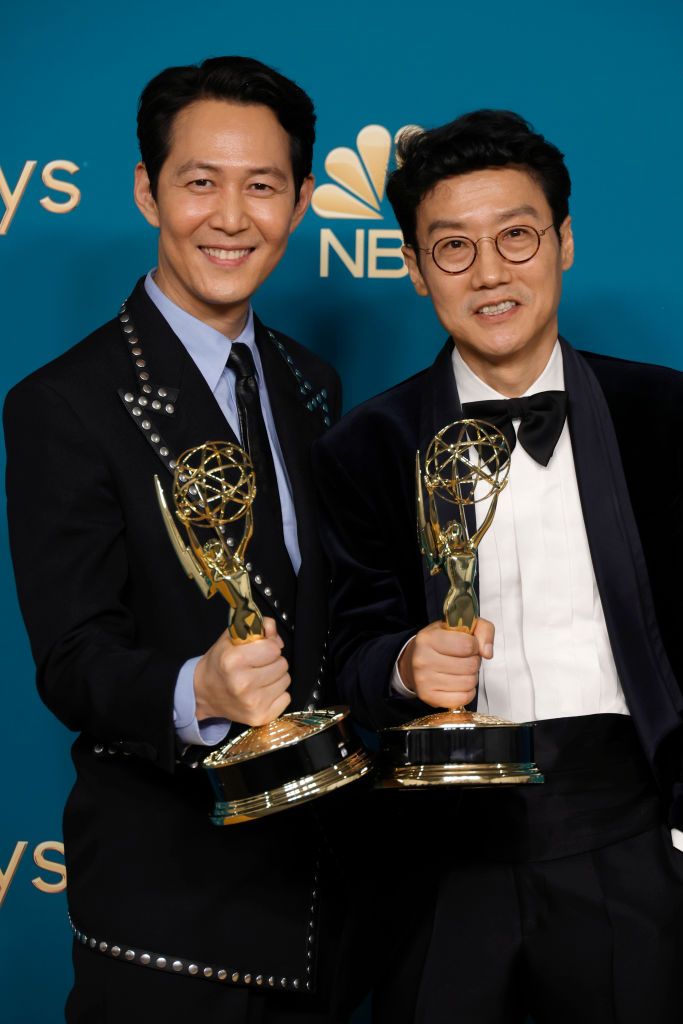 LOS ANGELES, CALIFORNIA - SEPTEMBER 12: (L-R) Lee Jung-jae, winner of Outstanding Lead Actor in a Drama Series for "Squid Game" and Hwang Dong-hyuk, winner of Outstanding Directing For A Drama Series for "Squid Game" pose in the press room during the 74th Primetime Emmys at Microsoft Theater on September 12, 2022 in Los Angeles, California. (Photo by Frazer Harrison/Getty Images)