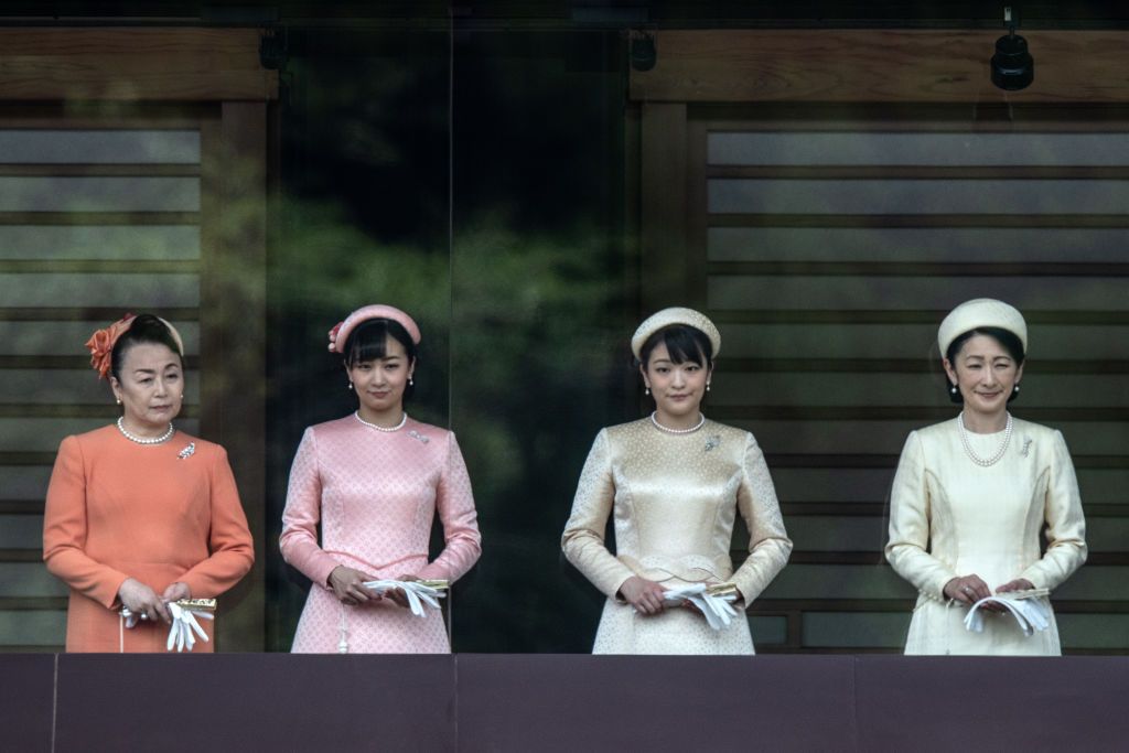 TOKYO, JAPAN - MAY 04: (L-R) Princess Tomohito of Mikasa, Princess Kako, Princess Mako and Princess Kiko listen as Emperor Naruhito of Japan makes his first public speech from the balcony of the Imperial Palace on May 4, 2019 in Tokyo, Japan. Emperor Naruhito has made his first official public appearance following his ascension to the Chrysanthemum Throne last week after his father abdicated citing ill health. (Photo by Carl Court/Getty Images)