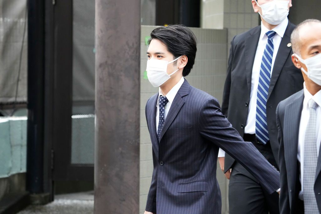 TOKYO, JAPAN - OCTOBER 26: Kei Komuro leaves his house on October 26, 2021 in Yokohama, Japan. Princess Mako is due to marry Kei Komuro today at a registry office following a relationship beset with controversy following the revelation that Mr Komuro's mother was embroiled in a financial dispute with a former fiancé. Following the wedding, Mako will renounce her royal entitlements and move with Komuro to New York. (Photo by Ken Ishii/Getty Images)