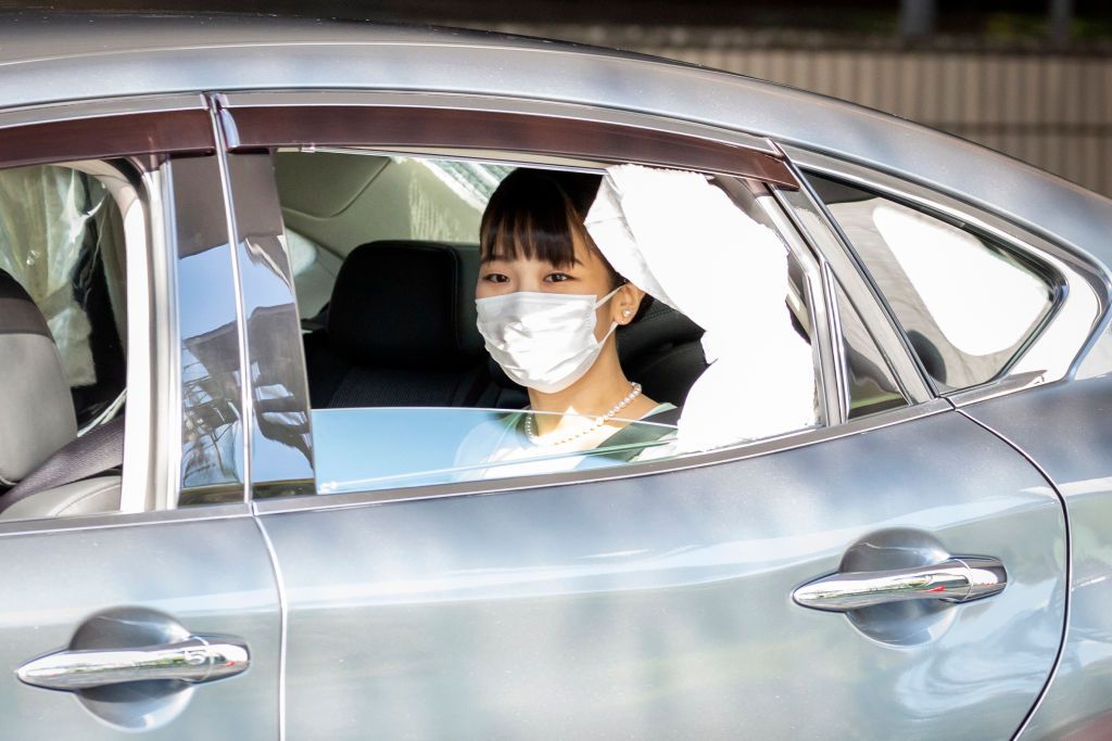 TOKYO, JAPAN - OCTOBER 26: Princess Mako arrives at the Hotel Grand Arc Hanzomon for a press conference with Komuro which will take place after registering their marriage this morning, on October 26, 2021 in Tokyo, Japan. Princess Mako is due to marry Kei Komuro today at a registry office following a relationship beset with controversy following the revelation that Mr. Komuro's mother was embroiled in a financial dispute with a former fiancé. Following the wedding, Mako will renounce her royal entitlements