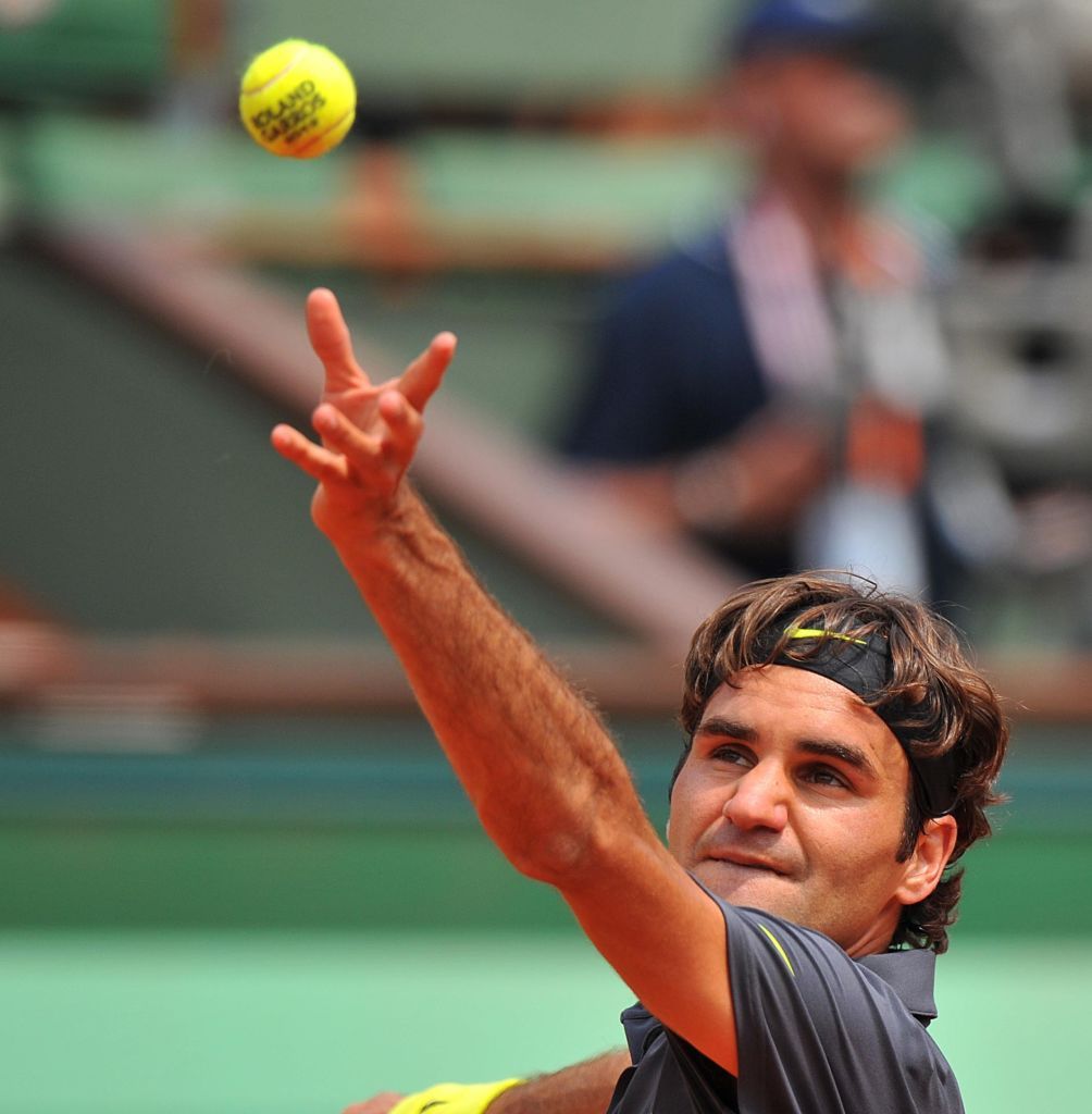 PARIS, FRANCE - (ARCHIVE): A file photo dated May 30, 2012 shows Roger Federer in action at the Men's second round match of the Roland Garros (French Open) Tennis Tournament in Paris, France. Swiss legend Roger Federer, a 20-time Grand Slam champion, announced on Thursday that he is retiring from professional tennis. (Photo by Mustafa Yalcin/Anadolu Agency via Getty Images)
