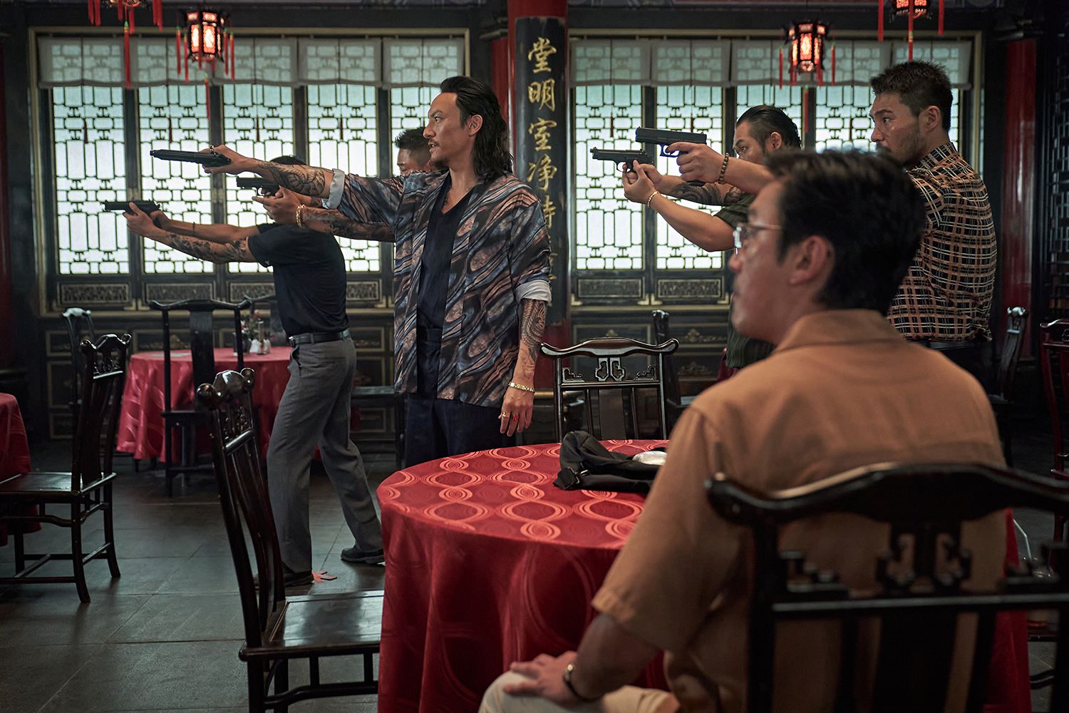 Narco-Saints (L to R) Chang Chen as Chen Zhen, Ha Jung-woo as Kang Ingu in Narco-Saints Cr. Cho Wonjin/Netflix Â© 2022