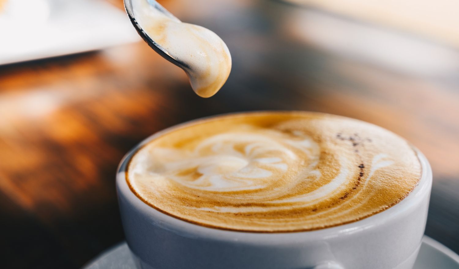 A latte is a coffee drink made with espresso and steamed milk.