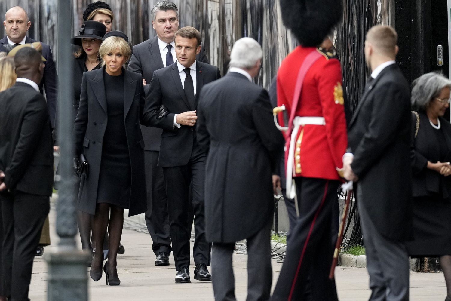 LONDON, ENGLAND - SEPTEMBER 19: Brigitte Macron and President of France, Emmanuel Macron arrive at Westminster Abbey ahead of the State Funeral of Queen Elizabeth II on September 19, 2022 in London, England. Elizabeth Alexandra Mary Windsor was born in Bruton Street, Mayfair, London on 21 April 1926. She married Prince Philip in 1947 and ascended the throne of the United Kingdom and Commonwealth on 6 February 1952 after the death of her Father, King George VI. Queen Elizabeth II died at Balmoral Castle in S