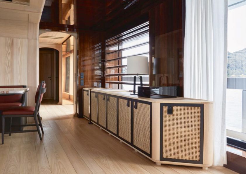 Rattan cabinet doors are among the subtle references to the modern Asian influences on this superyacht designed by Studio Liaigre
