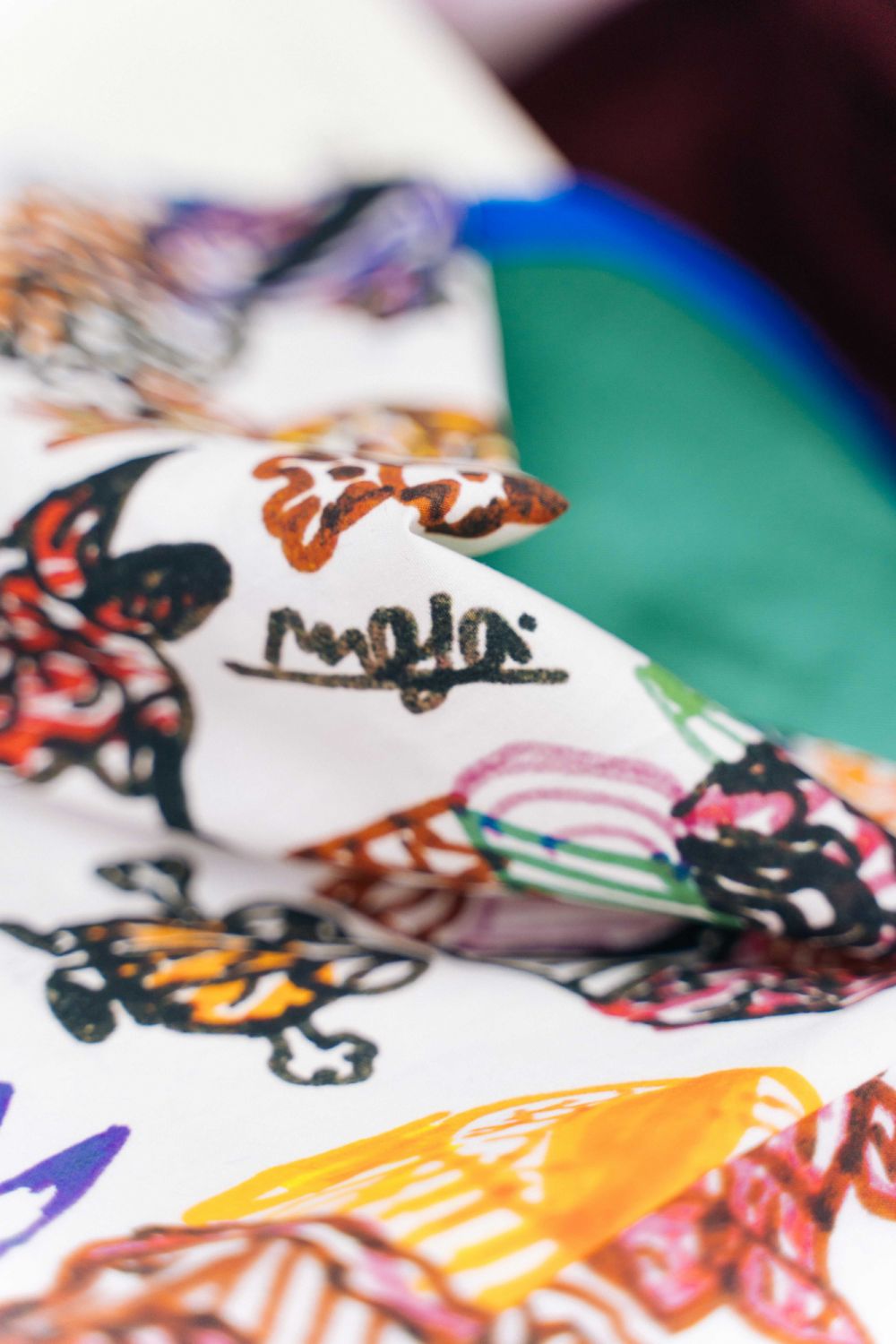 Maya's signature on the fabric