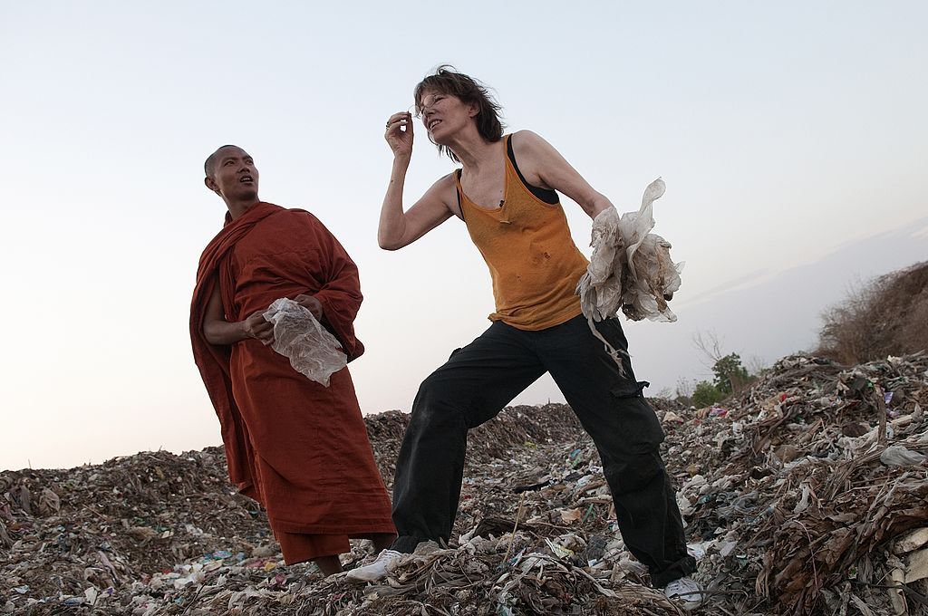 MAE SOT, TAK PROVINCE, THAILAND - 2010/05/13: Jane Birkin, the British-French actress and singer who has been a Burma pro-democracy activist for over a decade, made a four-day trip along the Thai-Burma border where she visited several organizations and projects.Birkin visits a dump site with Ashin Sopaka, an exile Burmese Buddhist monk, who is running a project for families from Burma collecting rubbish. These families are taken care of and relocated nearby by the monk's team.. (Photo by Thierry Falise/Li