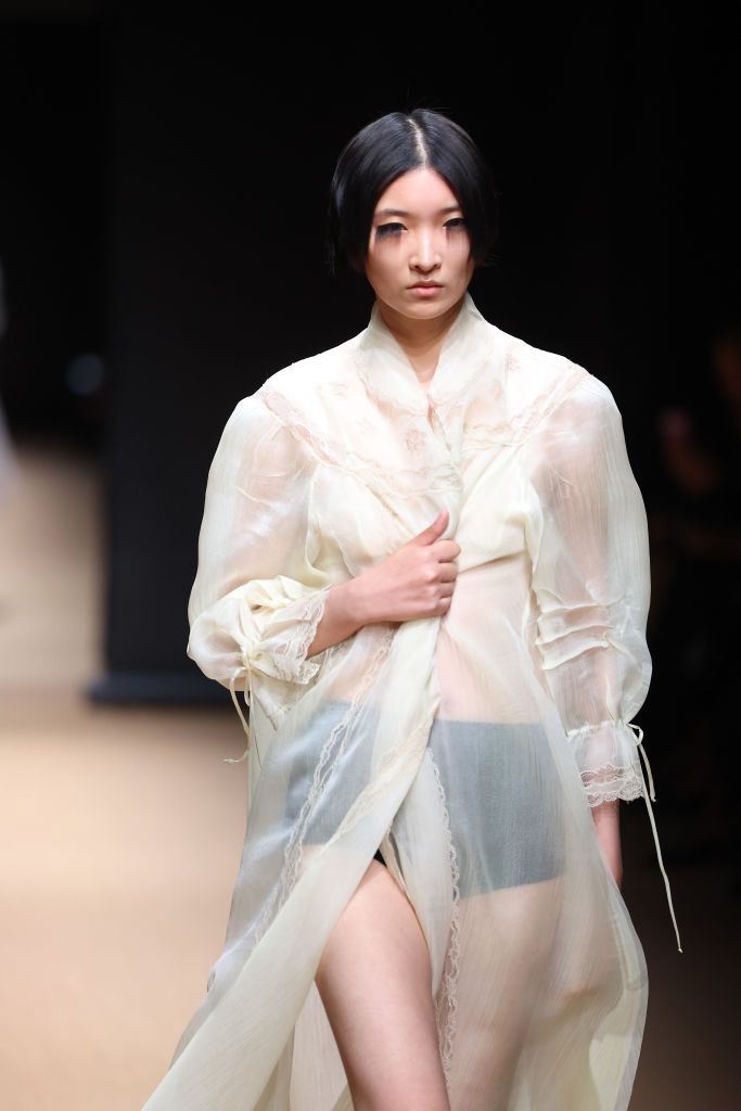 MILAN, ITALY - SEPTEMBER 22: A model walks the runway of the Prada Fashion Show during the Milan Fashion Week Womenswear Spring/Summer 2023 on September 22, 2022 in Milan, Italy. (Photo by Daniele Venturelli/WireImage)